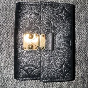 Louis Vuitton wallet.  Brand new.